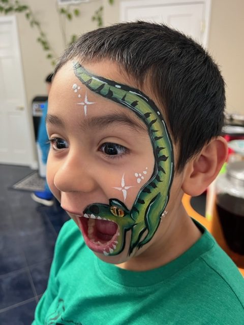 Reaction to face painting snake